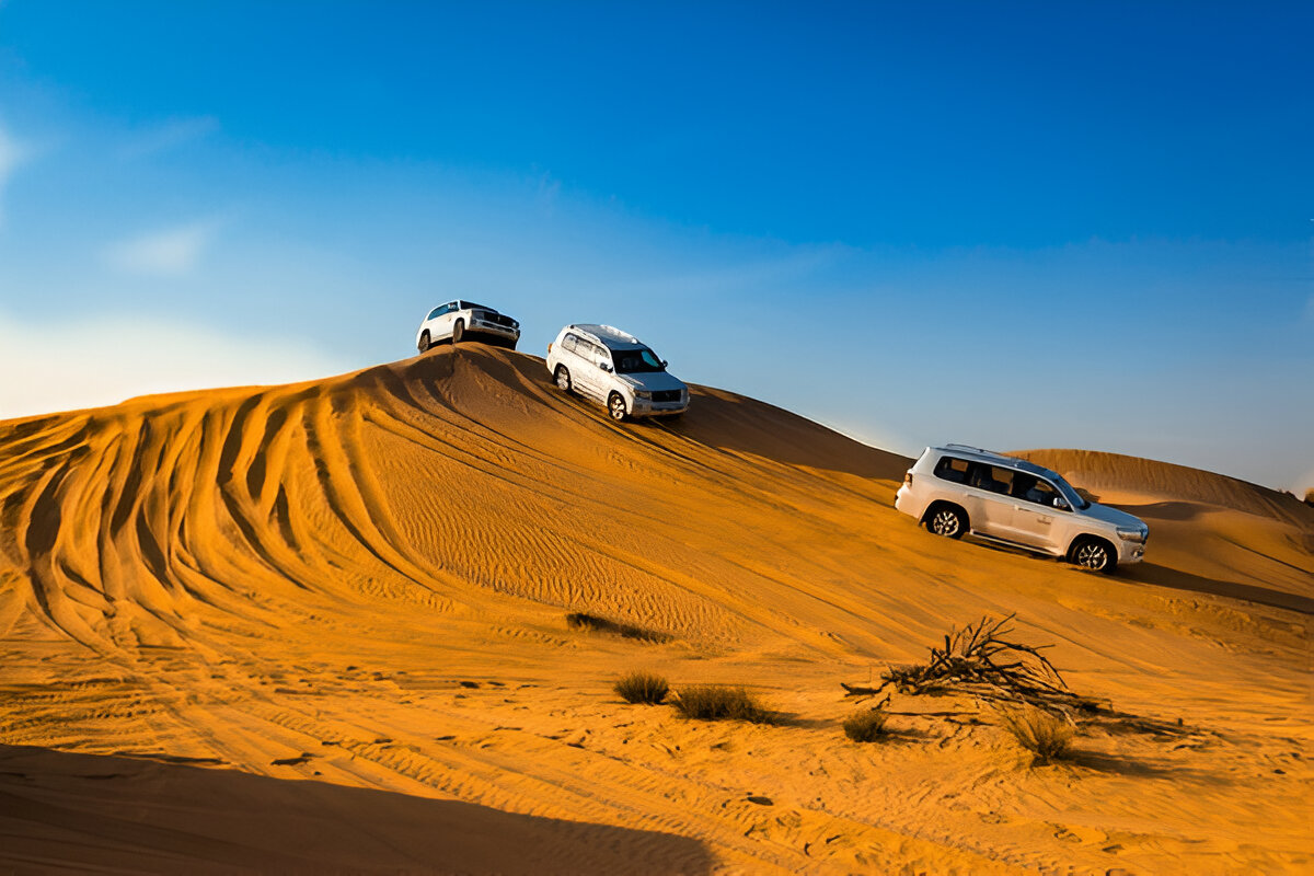 Private 4x4 vehicle with 2 guests driving through the Sahara Desert on a tour from Tangier Morocco