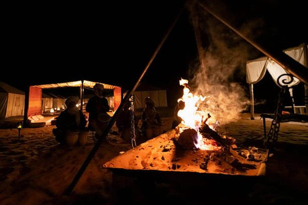 Traditional entertainment at a desert camp in Morocco